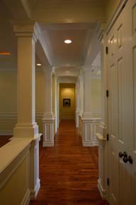 Dream Home Plans, custom home hallway design with architectural trim work, cinnamon hill estates